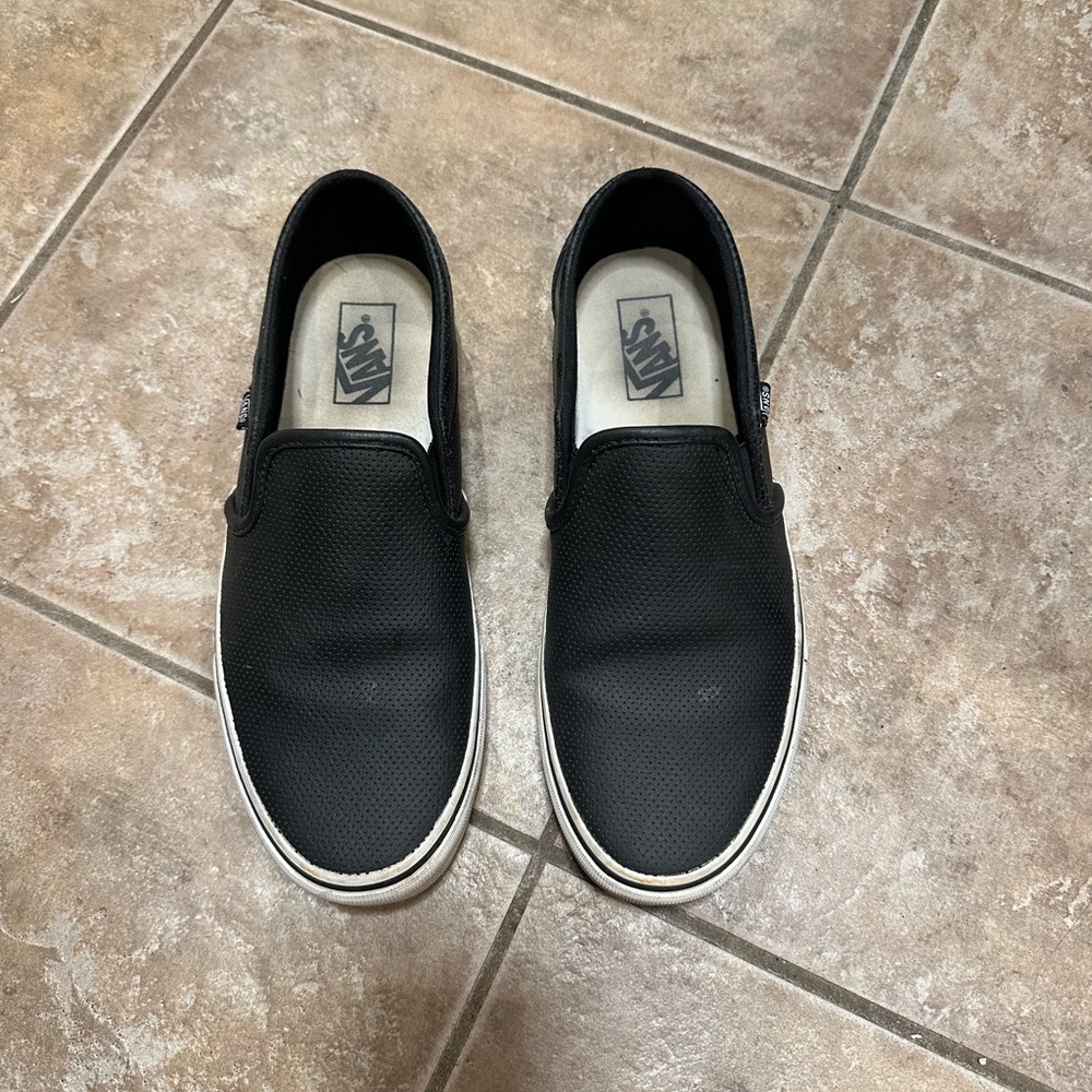 Women’s black leather vans